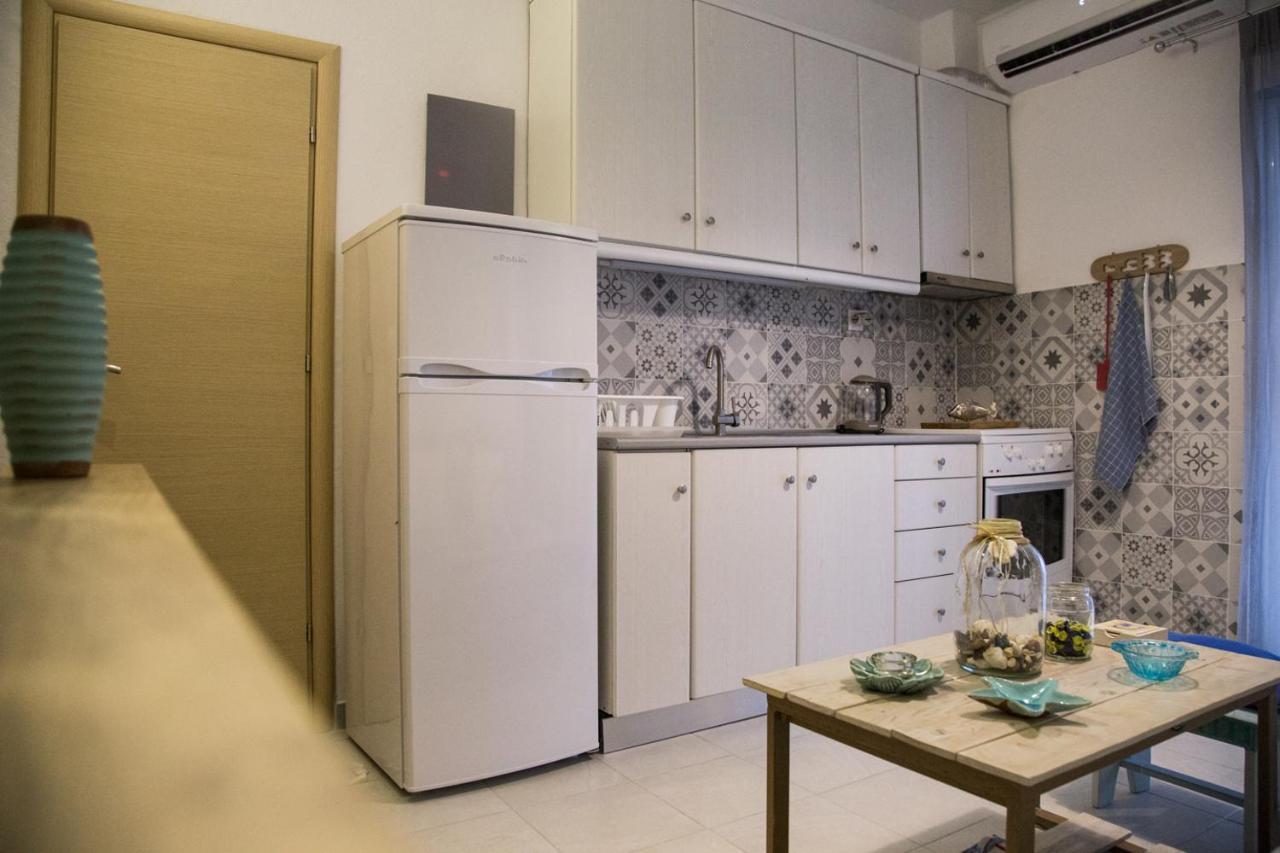 Grey Theros Apartments Paralia Dionysiou Buitenkant foto